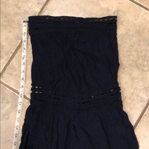 Navy wide leg strapless romper. Boutique